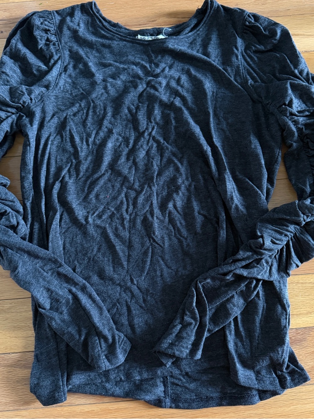 We The Free Dark Charcoal Knit Top with Ruffle Detail